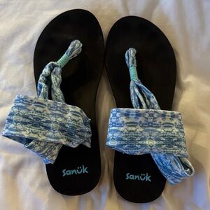 Sanuk Black Sandals with Blue Patterned Straps